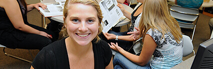 Girl Smiling in Classroom