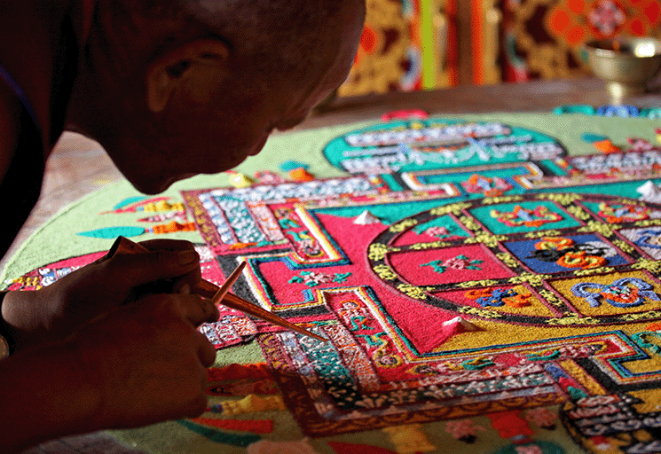 Tibetan monk sand painting